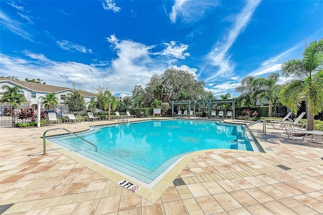 8676 Ice Wine St, Sarasota, FL 34238 - community pool with a pergola and a patio