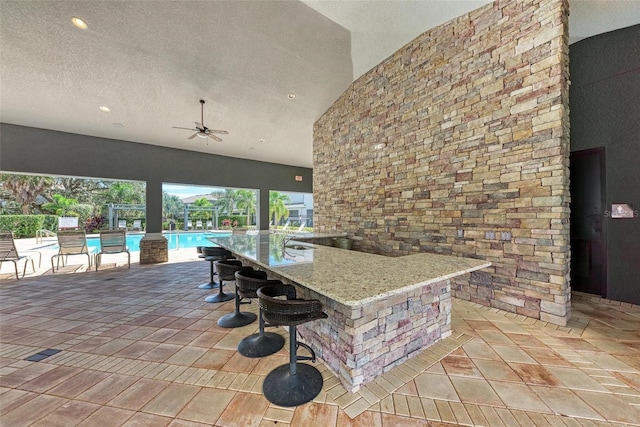 8676 Ice Wine St, Sarasota, FL 34238 - view of patio with an outdoor pool and ceiling fan
