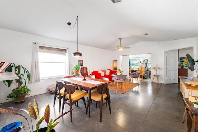 2511 Lantana Ln, Palmetto, FL 34221 - dining space featuring lofted ceiling, a ceiling fan, and concrete floors