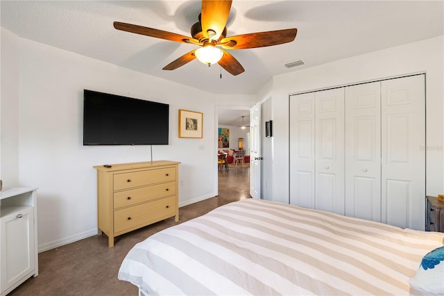 2511 Lantana Ln, Palmetto, FL 34221 - bedroom featuring a closet, a ceiling fan, and concrete floors