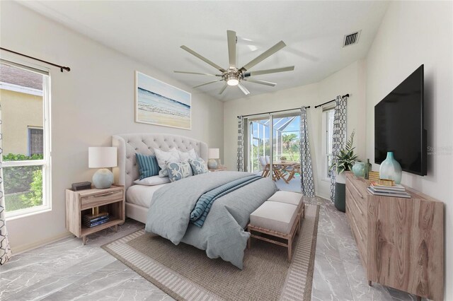 11915 Oak Ridge Dr, Parrish, FL 34219 - bedroom featuring light marble finish flooring, access to outside, and ceiling fan