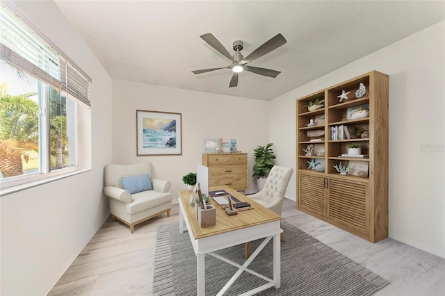 11915 Oak Ridge Dr, Parrish, FL 34219 - office space featuring a ceiling fan and light wood-style flooring