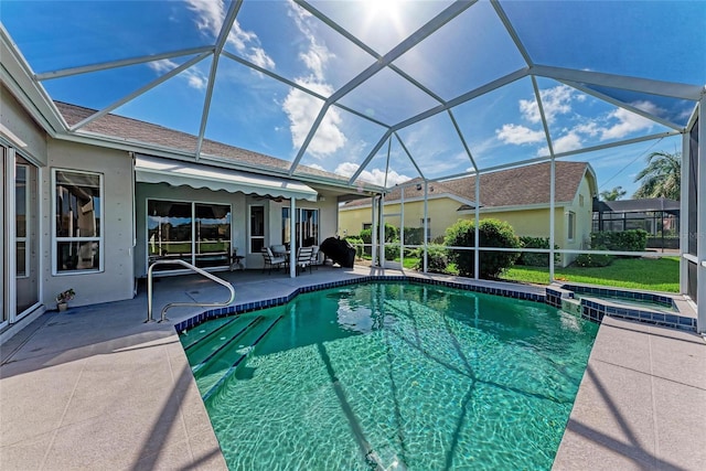 11915 Oak Ridge Dr, Parrish, FL 34219 - view of swimming pool featuring a patio area, a pool with connected hot tub, and glass enclosure