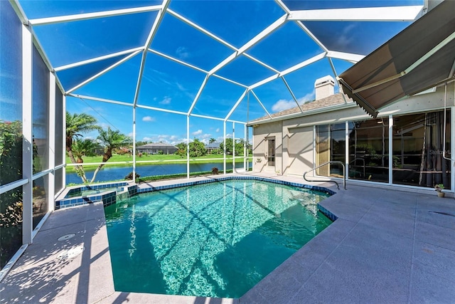 11915 Oak Ridge Dr, Parrish, FL 34219 - view of swimming pool with a patio area, glass enclosure, a pool with connected hot tub, and a water view