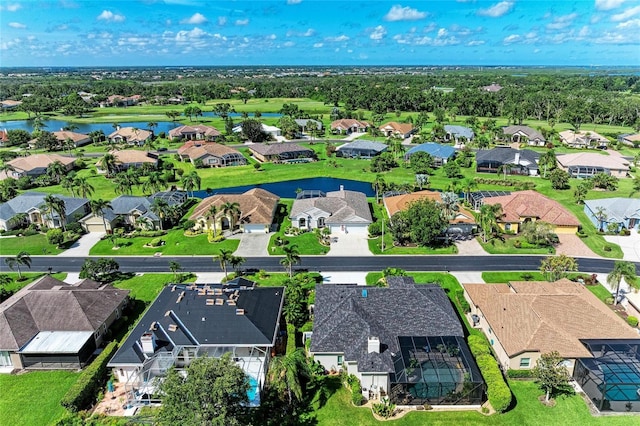 11915 Oak Ridge Dr, Parrish, FL 34219 - aerial perspective of suburban area with a large body of water