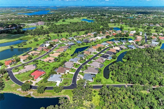 11915 Oak Ridge Dr, Parrish, FL 34219 - aerial view of property's location with nearby suburban area and a large body of water