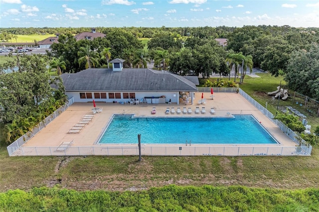 11915 Oak Ridge Dr, Parrish, FL 34219 - community pool with a patio area and view of scattered trees
