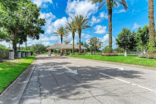 11915 Oak Ridge Dr, Parrish, FL 34219 - view of asphalt road with curbs