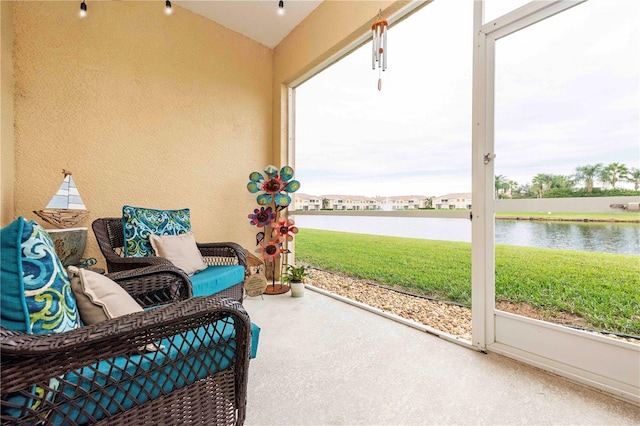 3698 Parkridge Cir Unit 26-104, Sarasota, FL 34243 - sunroom / solarium with a water view and lofted ceiling