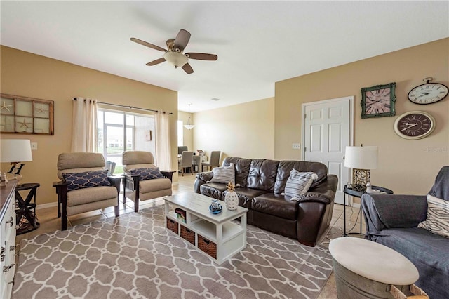 3698 Parkridge Cir Unit 26-104, Sarasota, FL 34243 - living room with ceiling fan and baseboards