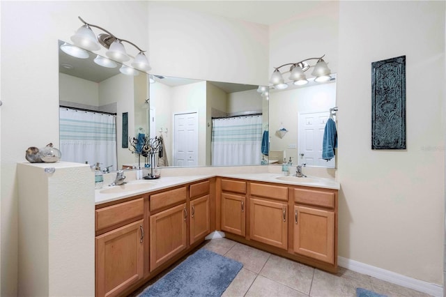 3698 Parkridge Cir Unit 26-104, Sarasota, FL 34243 - bathroom featuring tile patterned floors, double vanity, and a shower with shower curtain