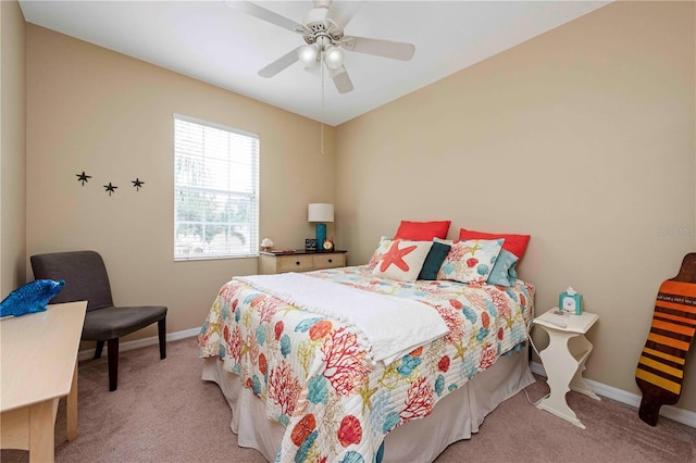 3698 Parkridge Cir Unit 26-104, Sarasota, FL 34243 - bedroom with carpet floors and a ceiling fan