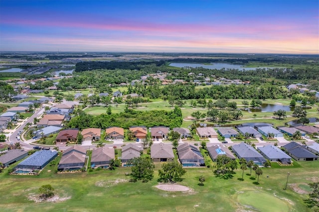 9123 Raes Creek Pl, Palmetto, FL 34221 - aerial view of property and surrounding area with a nearby body of water, nearby suburban area, and a local golf course