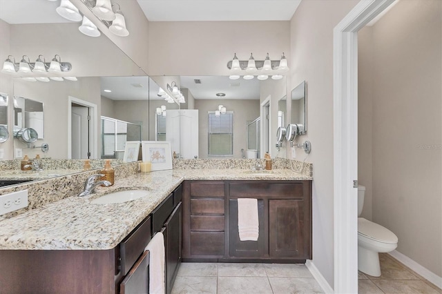 9123 Raes Creek Pl, Palmetto, FL 34221 - full bathroom with tile patterned flooring, a shower stall, and double vanity