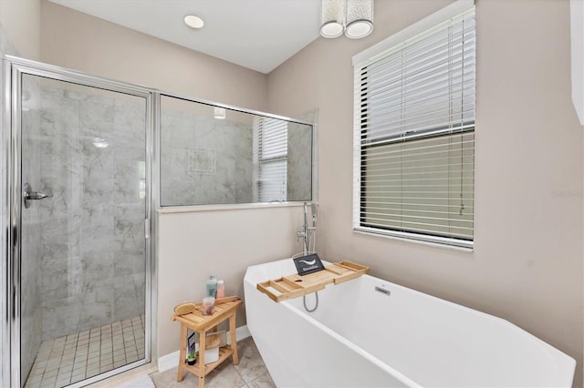 9123 Raes Creek Pl, Palmetto, FL 34221 - full bath with a stall shower and a soaking tub