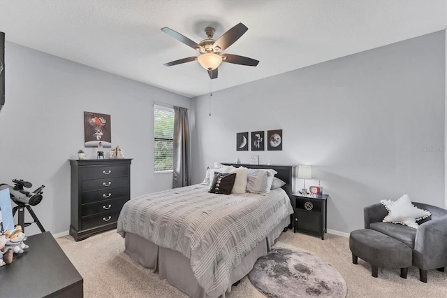 9123 Raes Creek Pl, Palmetto, FL 34221 - bedroom with light colored carpet and ceiling fan