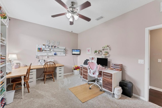 9123 Raes Creek Pl, Palmetto, FL 34221 - carpeted home office featuring a ceiling fan and baseboards