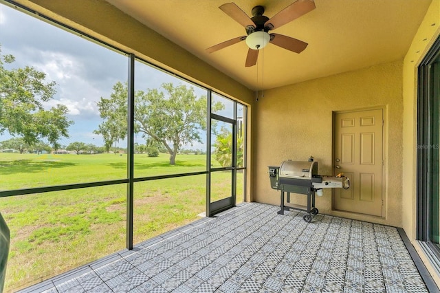 9123 Raes Creek Pl, Palmetto, FL 34221 - unfurnished sunroom with ceiling fan