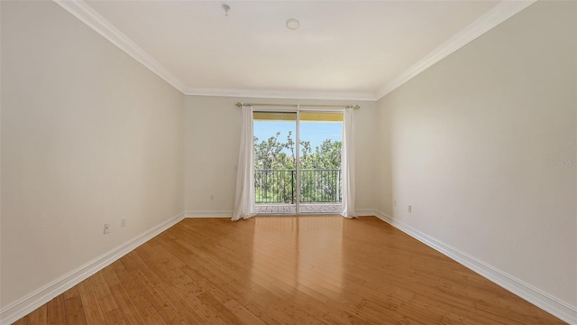 1512 3rd Street Cir E, Palmetto, FL 34221 - spare room with light wood-style floors and crown molding