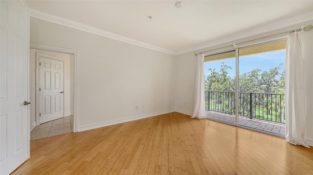 1512 3rd Street Cir E, Palmetto, FL 34221 - empty room with light wood-style floors and ornamental molding