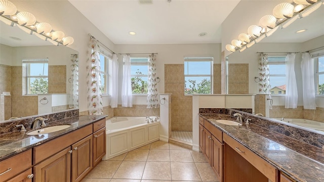 1512 3rd Street Cir E, Palmetto, FL 34221 - full bathroom with a bath, two vanities, and tile patterned floors