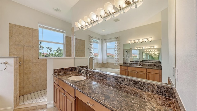 1512 3rd Street Cir E, Palmetto, FL 34221 - bathroom with walk in shower, plenty of natural light, and two vanities