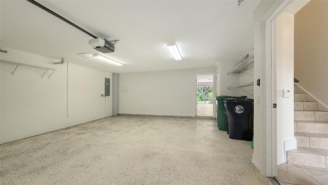 1512 3rd Street Cir E, Palmetto, FL 34221 - garage featuring electric panel and a garage door opener