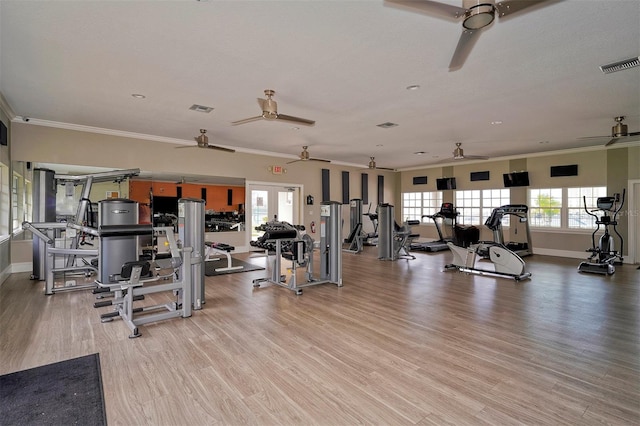 1512 3rd Street Cir E, Palmetto, FL 34221 - workout area with ceiling fan, ornamental molding, and light wood-style flooring