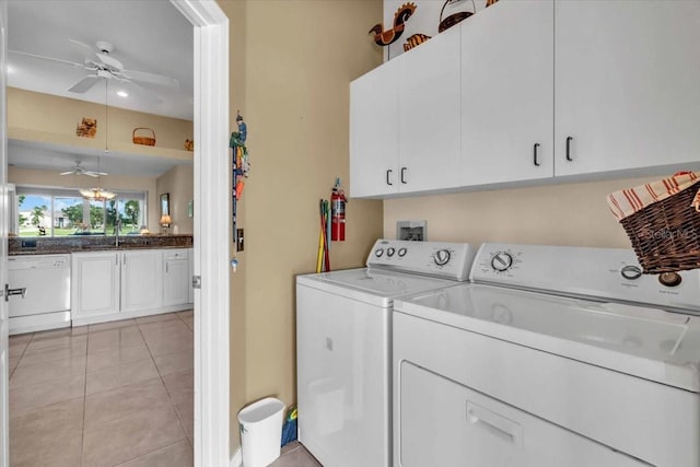 6908 Stoneywalk Ct, Bradenton, FL 34203 - laundry area with cabinet space, washer and dryer, a ceiling fan, and light tile patterned flooring