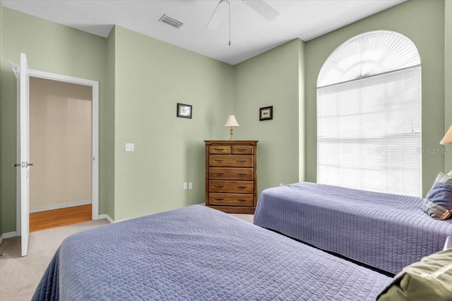 6908 Stoneywalk Ct, Bradenton, FL 34203 - carpeted bedroom with ceiling fan and baseboards