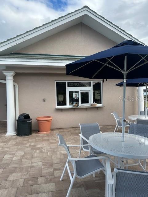 6908 Stoneywalk Ct, Bradenton, FL 34203 - view of patio / terrace featuring outdoor dining space
