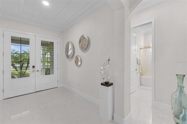 17204 Bullhorn Cir, Punta Gorda, FL 33982 - foyer with french doors, crown molding, and light tile patterned floors