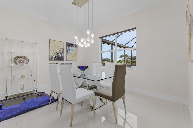 17204 Bullhorn Cir, Punta Gorda, FL 33982 - tiled dining room featuring baseboards and crown molding