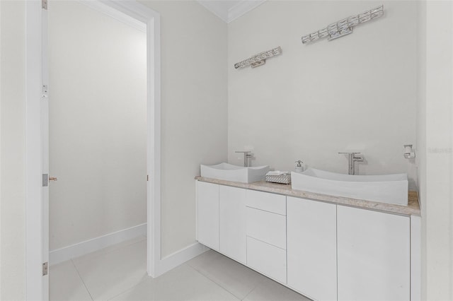 17204 Bullhorn Cir, Punta Gorda, FL 33982 - full bathroom featuring tile patterned floors, crown molding, and double vanity