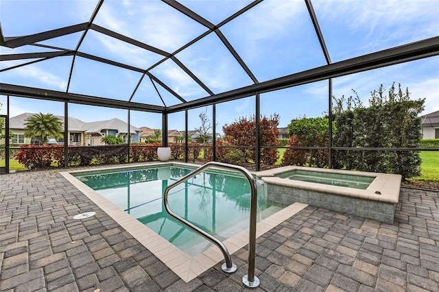 17204 Bullhorn Cir, Punta Gorda, FL 33982 - view of pool with a patio, glass enclosure, a pool with connected hot tub, and a residential view