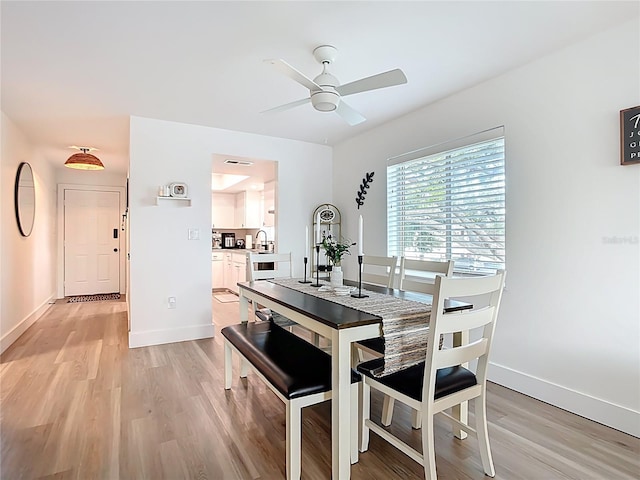 516 Parkdale Mews Unit 516, Venice, FL 34285 - dining space with light wood finished floors and ceiling fan