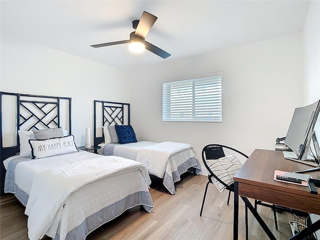 516 Parkdale Mews Unit 516, Venice, FL 34285 - bedroom with light wood-style flooring, a ceiling fan, and an office area