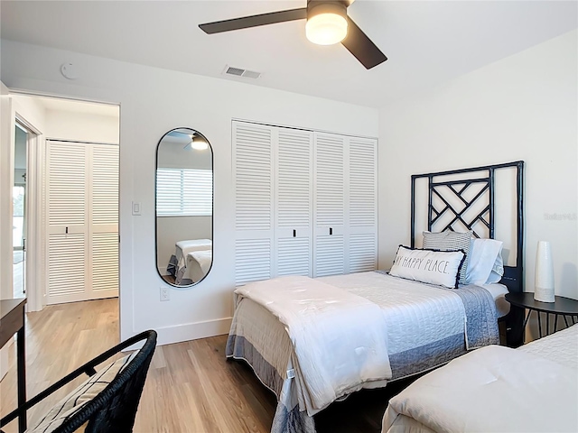 516 Parkdale Mews Unit 516, Venice, FL 34285 - bedroom featuring light wood-style flooring, a ceiling fan, and a closet