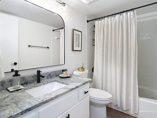 516 Parkdale Mews Unit 516, Venice, FL 34285 - full bath featuring vanity, shower / tub combo, and wood finished floors