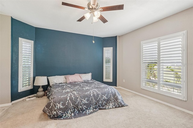 25433 Colon Dr, Punta Gorda, FL 33983 - carpeted bedroom with ceiling fan and baseboards