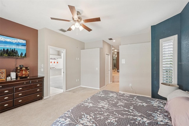 25433 Colon Dr, Punta Gorda, FL 33983 - bedroom with carpet, ensuite bath, and a ceiling fan