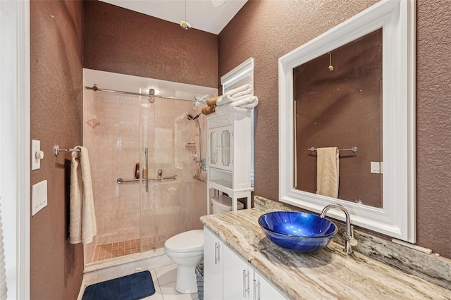 25433 Colon Dr, Punta Gorda, FL 33983 - full bath with a stall shower, vanity, tile patterned flooring, and a textured wall
