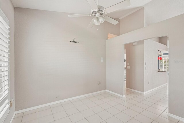 25433 Colon Dr, Punta Gorda, FL 33983 - spare room featuring a ceiling fan, light tile patterned floors, and a high ceiling