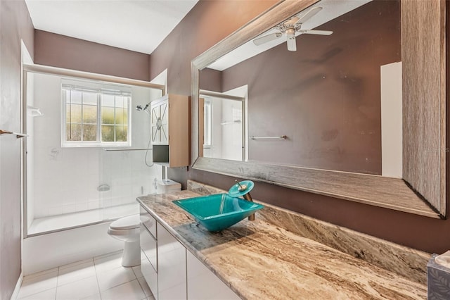 25433 Colon Dr, Punta Gorda, FL 33983 - full bathroom featuring enclosed tub / shower combo, vanity, ceiling fan, and tile patterned flooring