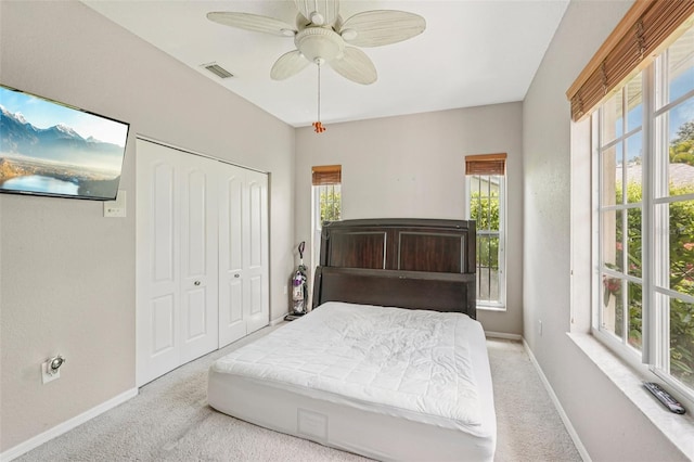 25433 Colon Dr, Punta Gorda, FL 33983 - bedroom featuring carpet flooring, a closet, and a ceiling fan
