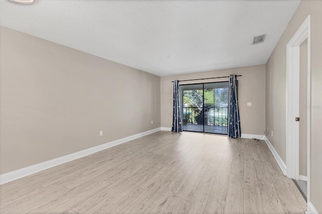 7866 Eagle Creek Dr Unit 7866, Sarasota, FL 34243 - spare room with light wood finished floors and baseboards