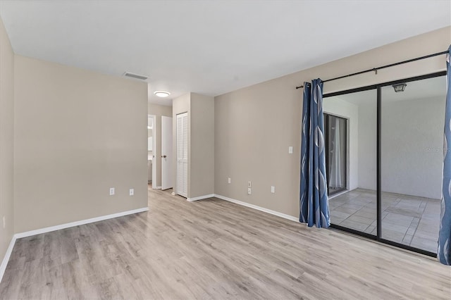 7866 Eagle Creek Dr Unit 7866, Sarasota, FL 34243 - unfurnished room with light wood-style flooring