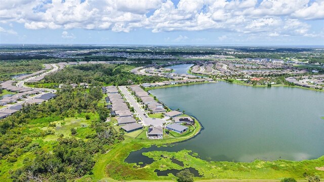 5910 Hevena Ct, Palmetto, FL 34221 - aerial perspective of suburban area with a large body of water