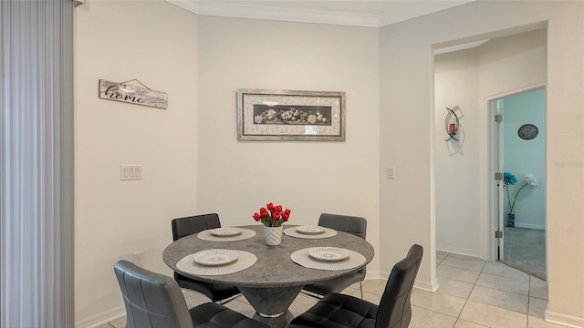5910 Hevena Ct, Palmetto, FL 34221 - dining room with crown molding and light tile patterned floors