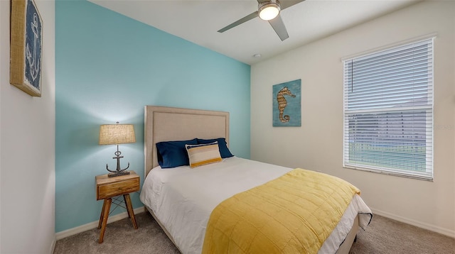 5910 Hevena Ct, Palmetto, FL 34221 - carpeted bedroom featuring baseboards and a ceiling fan